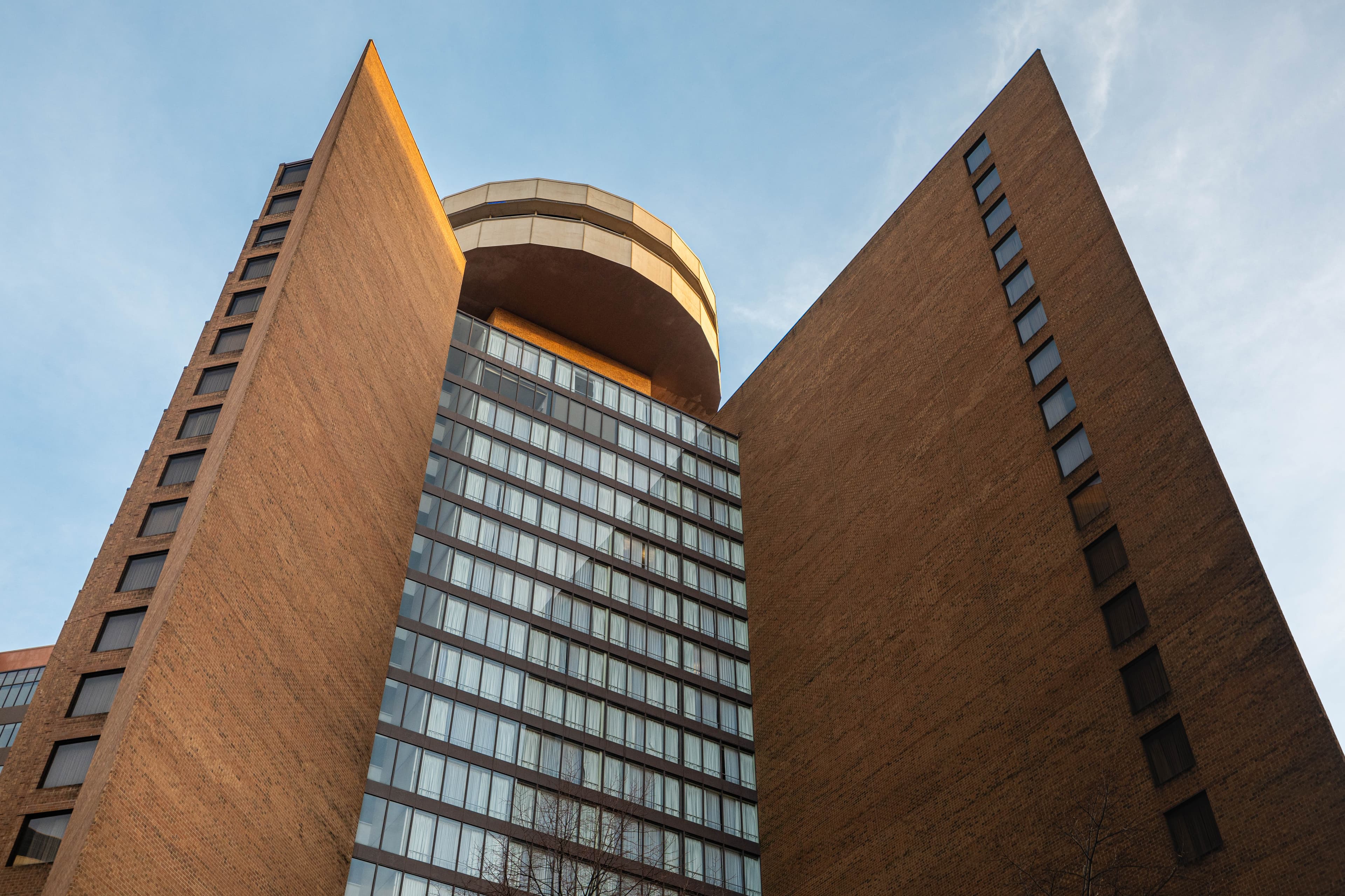 Low-angle architectural photograph of a modern brick building